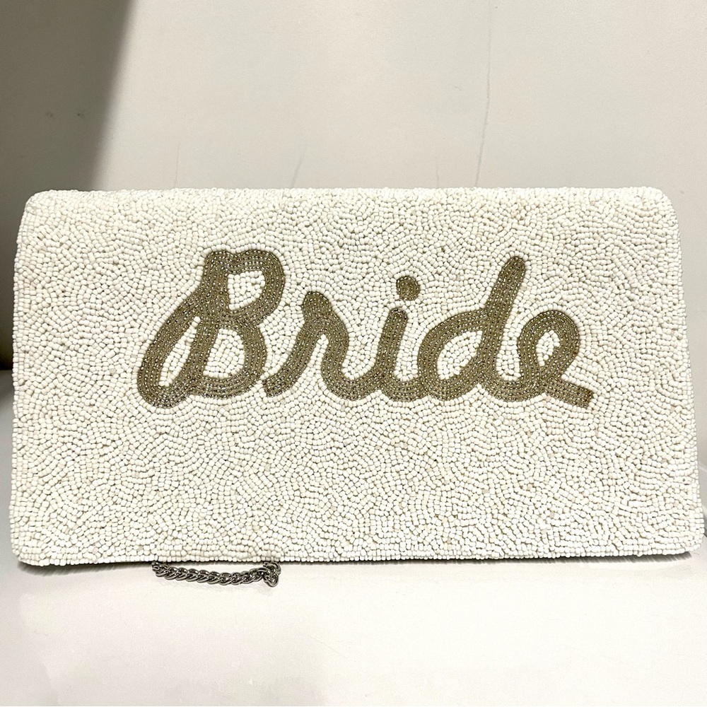 BRIDE white crossbody embossed with beads. One time used!!
